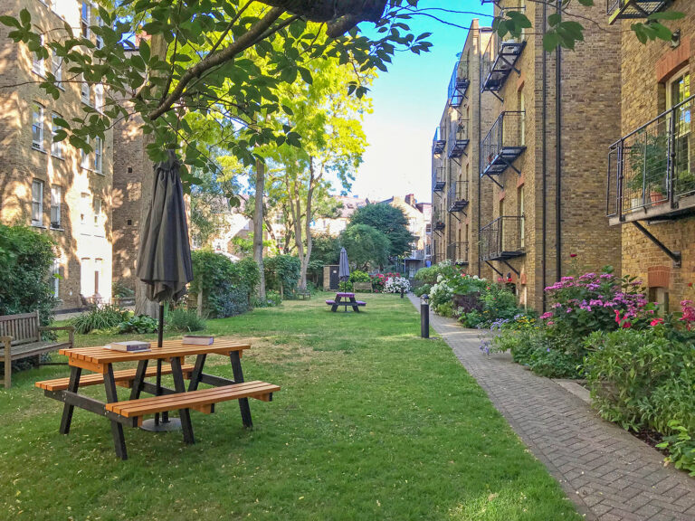A view of the communal gardens at Morshead Mansions showing the new seating areas