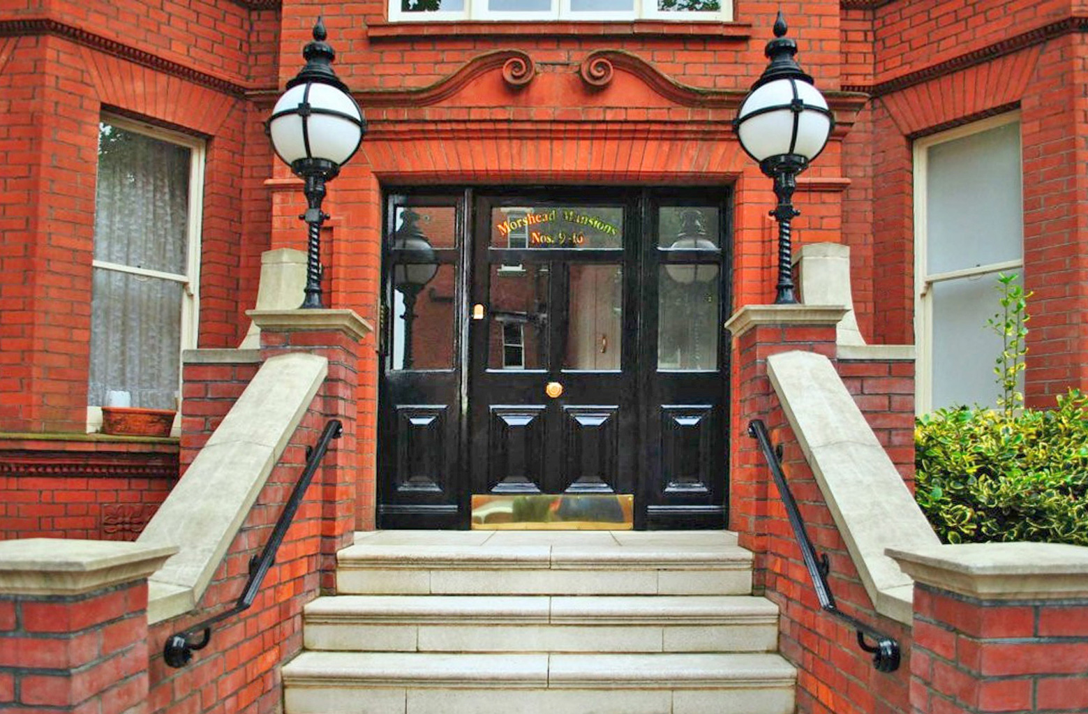 The red brick entrances at Morshead Mansions